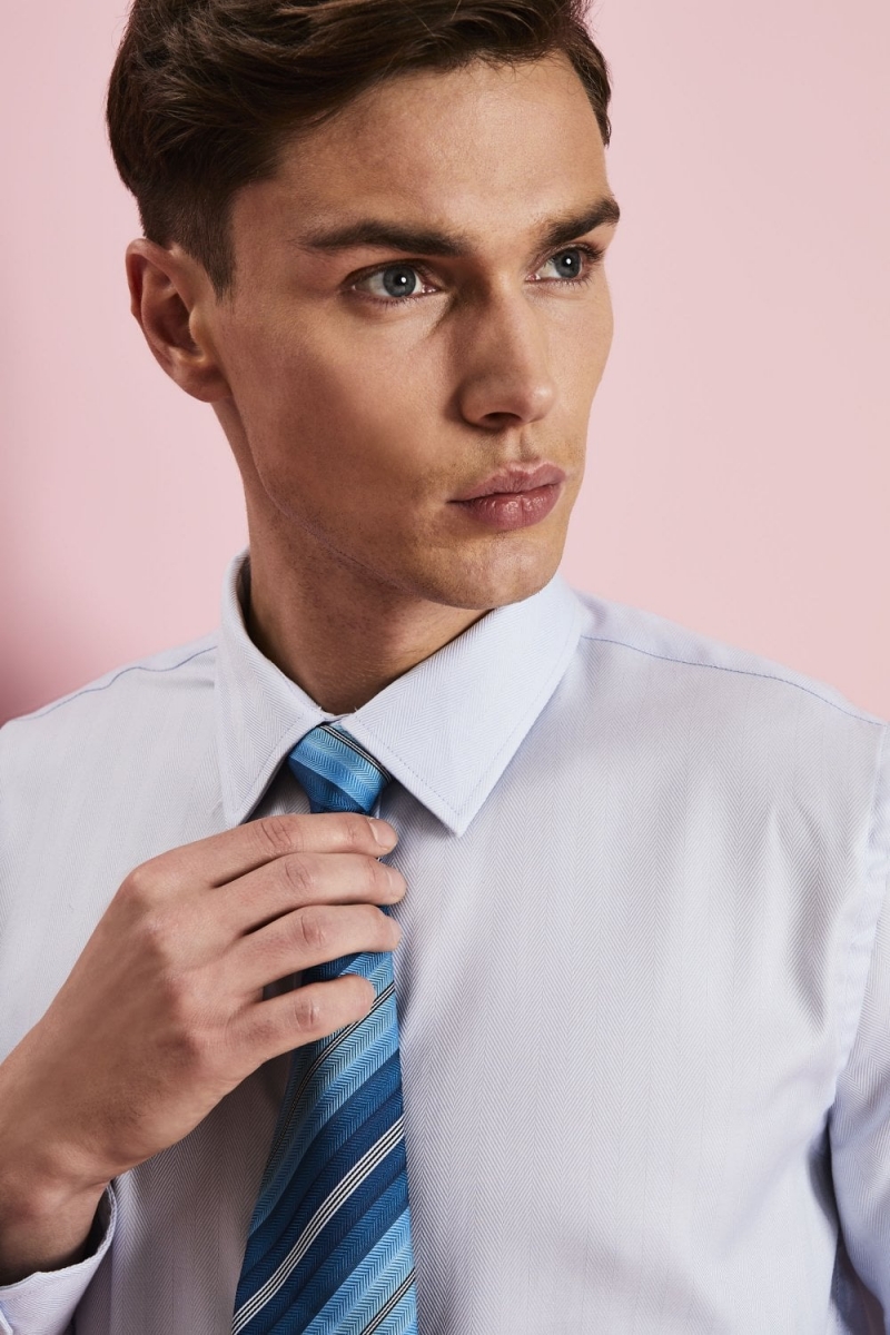 mens teal vest and tie